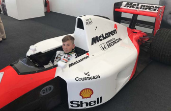 A young kart driver in the land of (big) toys