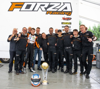 The team on the podium in the WSK Final Cup at Castelletto di Branduzzo .