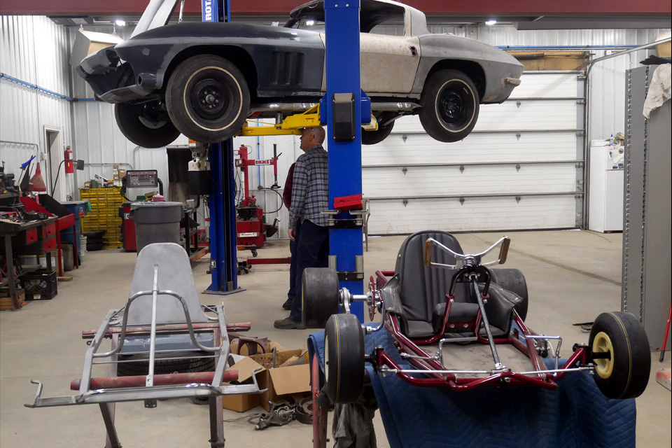 Early sixties SAE frame on left ready for paint, late sixties Red Devil plus Corvette Stingray circa 1966 on ramp Vintage Travels with Max-Torque Jim: Don Thompson’s Car and Kart Restorations