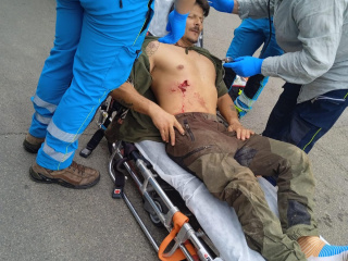 Manetti carried on a ambulance the day he was attacked by a wild boar in the woods - 2 weeks earlier the World Championship